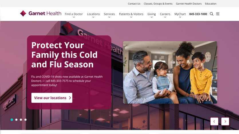 Garnet Health homepage promoting flu and COVID-19 shots with family image and location button