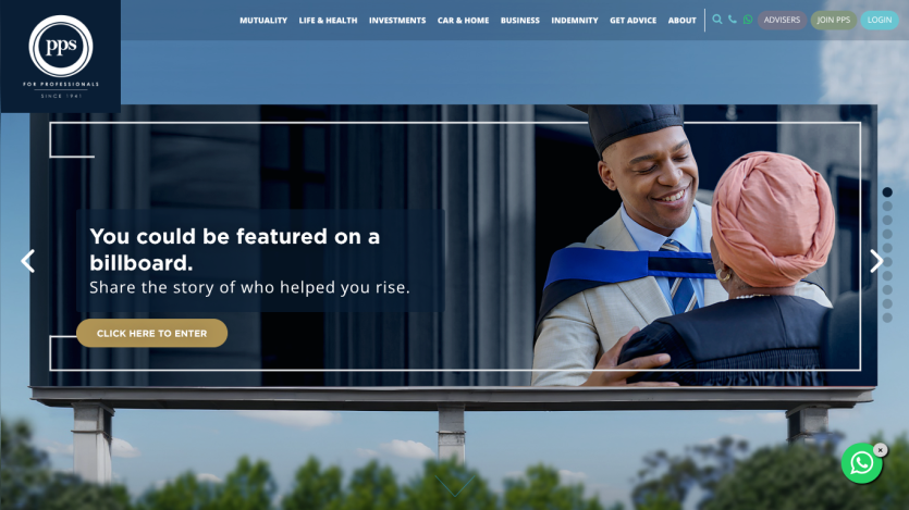 Website hero promoting a billboard feature with a graduate embracing a woman, navigation menu visible