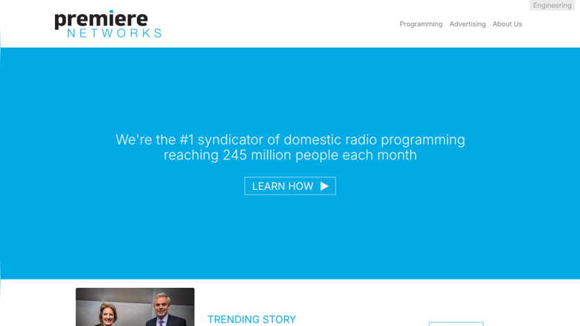 Premiere Networks homepage highlighting its position as the #1 domestic radio programming syndicator reaching 245 million monthly