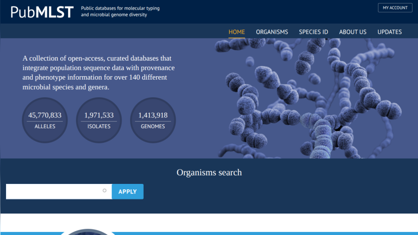 PubMLST homepage with navigation, description of microbial databases, statistics on alleles, isolates, genomes, and an organism search bar.