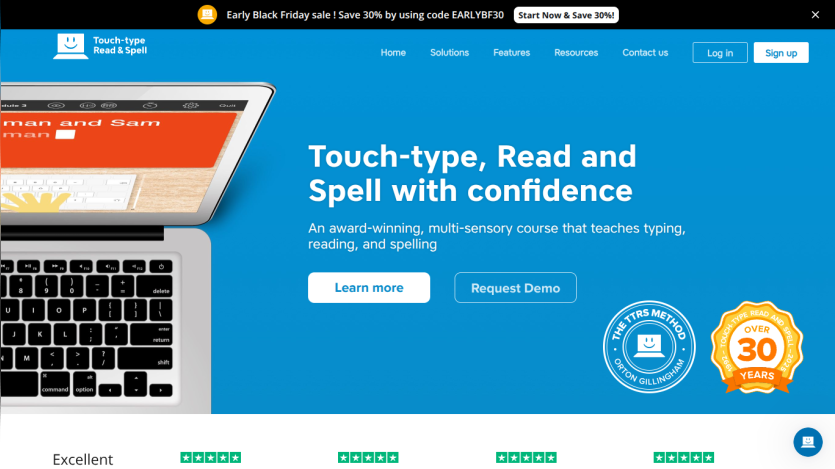 Touch-type, Read and Spell course homepage with navigation, call to action buttons, and promotional banner