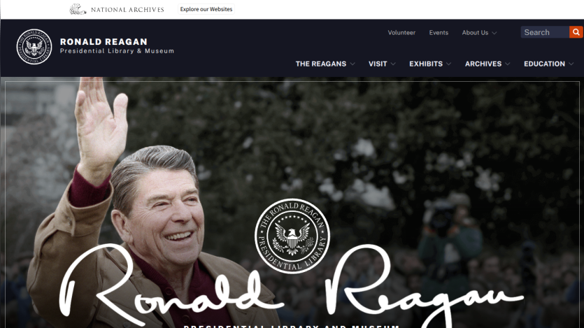 Ronald Reagan Presidential Library homepage featuring a smiling Reagan waving, with navigation options above.