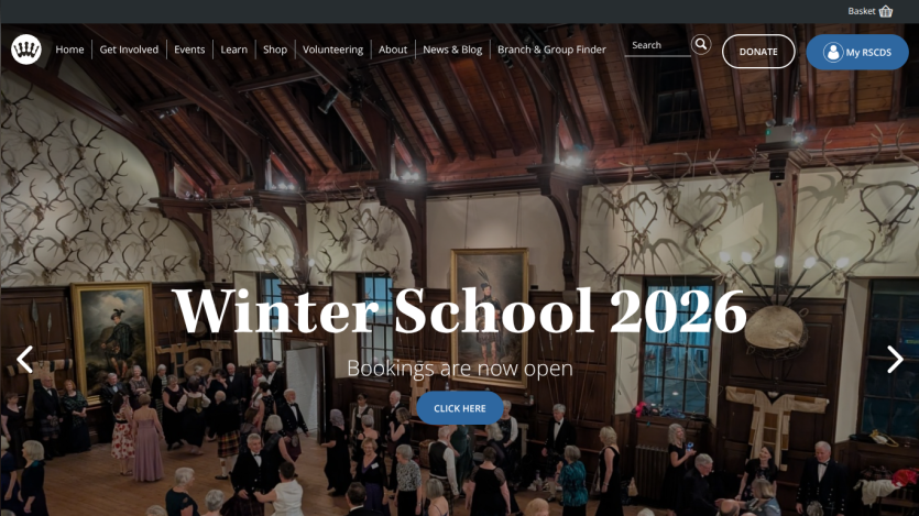 Winter School 2026 bookings open with people dancing in a decorated hall