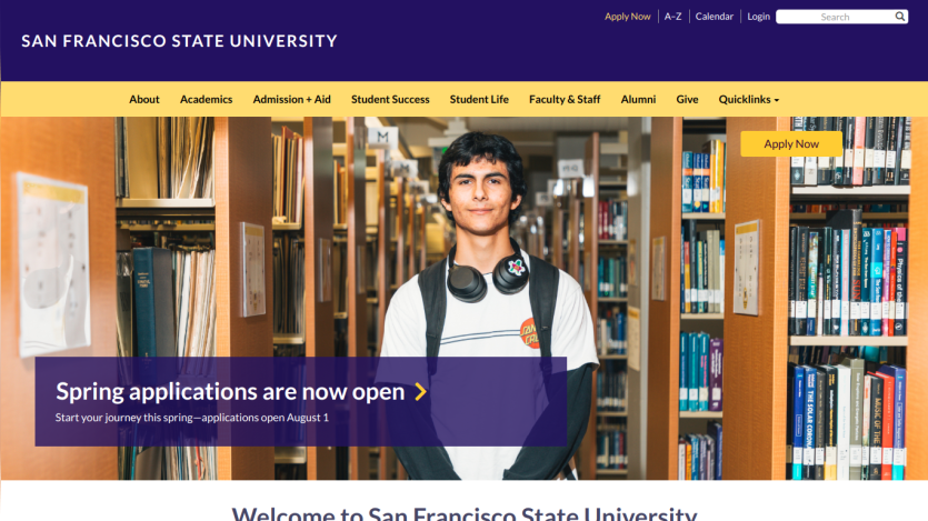Spring applications are now open at San Francisco State University, featuring a student in a library.