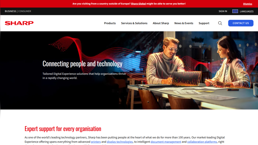 Sharp website homepage with headline connecting people and technology, showing people working in a cafe setting