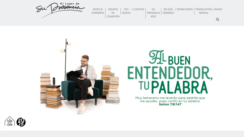 Website header with navigation and a hero section showing a man reading surrounded by stacks of books and a Spanish Bible verse about trusting God's word