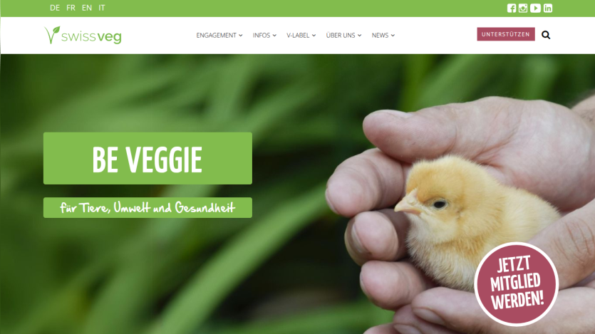 Swissveg homepage with 'Be Veggie' slogan and image of hands holding a chick