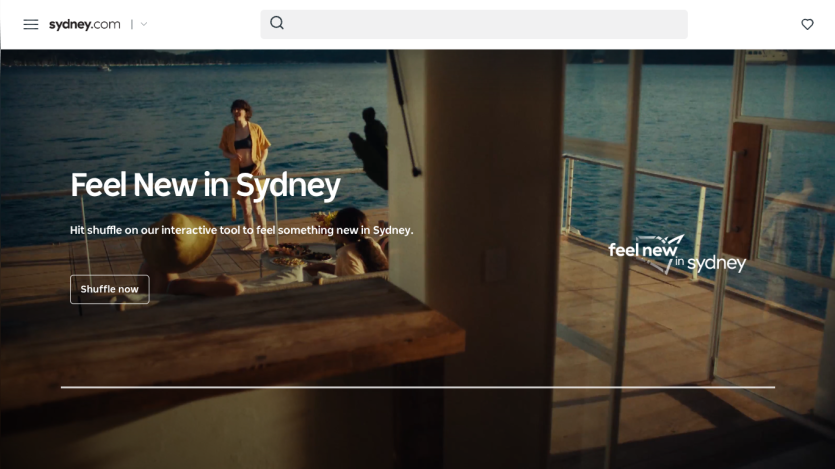 Promotional banner for Sydney with the text 'Feel New in Sydney' and a scenic view.