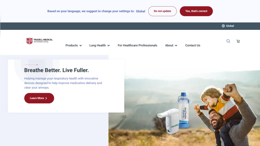 Trudell Medical International homepage with respiratory health message and image of man carrying child with medical devices