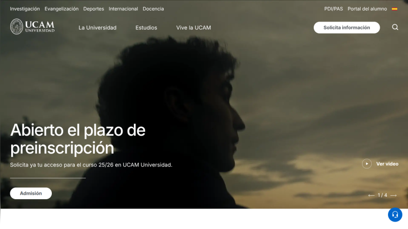 UCAM University homepage featuring a student and enrollment announcement.