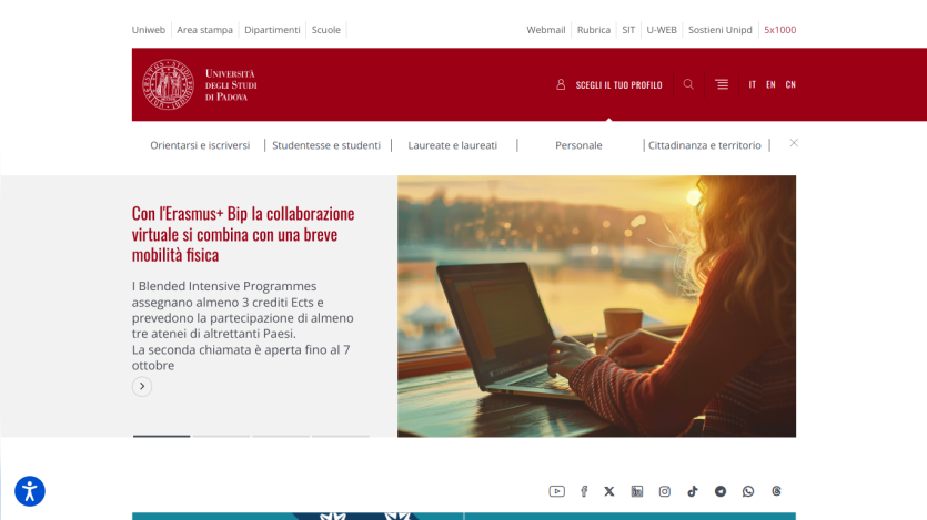 Website homepage featuring a woman using a laptop with a promotional message.