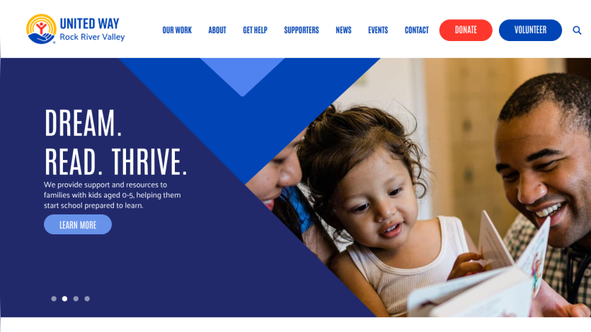 Homepage with navigation bar, large hero image of a mountain landscape, and headline 'Explore the World Outdoors'
