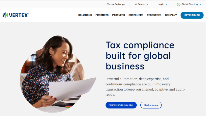 Vertex website showcasing tax compliance solutions with a woman working on a laptop.