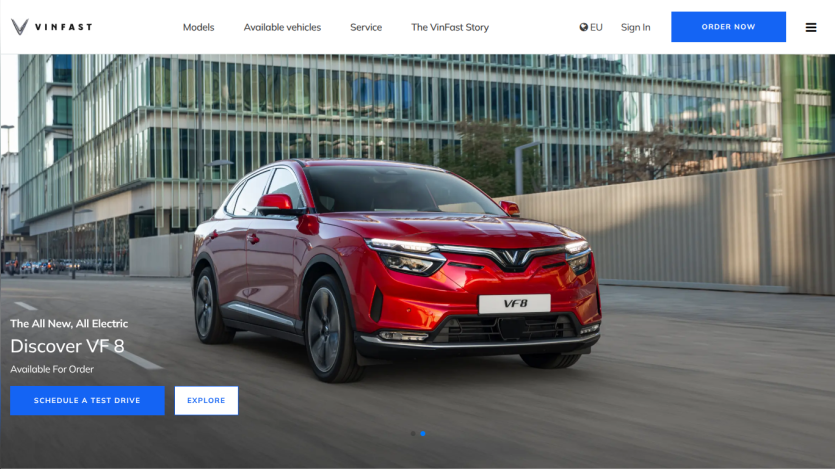 Electric car VF 8 showcased with options to schedule a test drive or explore on VinFast website