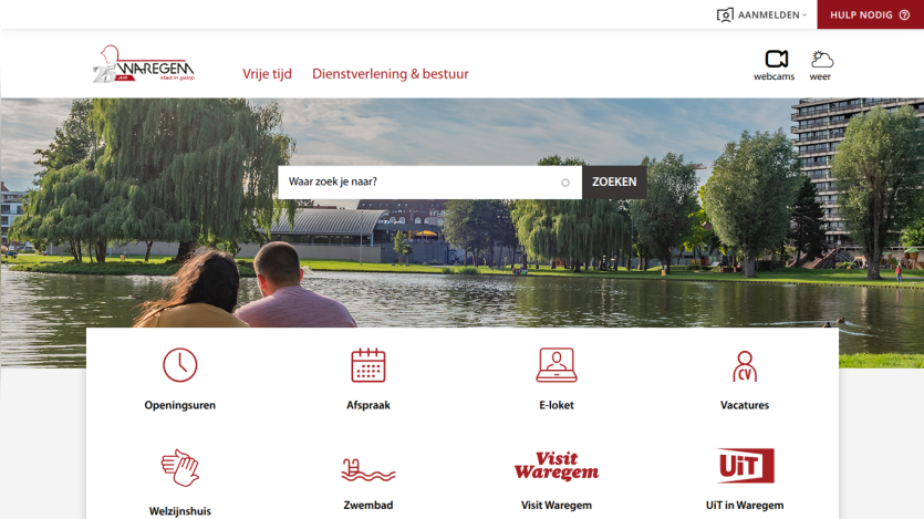City of Waregem website with search bar, navigation links, and icons for services like opening hours, appointments, and swimming pool
