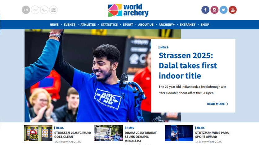 World Archery homepage featuring news about Dalal's first indoor title at Strassen 2025 with navigation menu and social icons