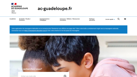 Educational website homepage with navigation menu and a child looking down, featuring a search bar and informational banner.