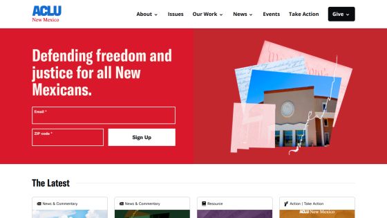 ACLU New Mexico homepage with navigation menu, headline about defending freedom and justice, email and ZIP code signup form, and an image of a building.
