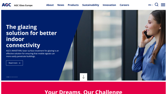 AGC Glass Europe homepage featuring glazing solutions for better indoor connectivity with a woman on phone by a window