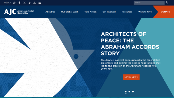 AJC homepage featuring 'Architects of Peace: The Abraham Accords Story' with a call to action button.
