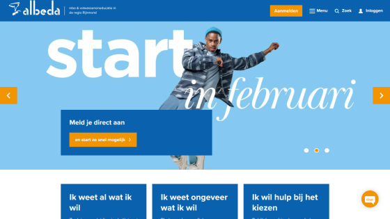 Educational website hero with call to action to register and start in February, navigation and login options visible