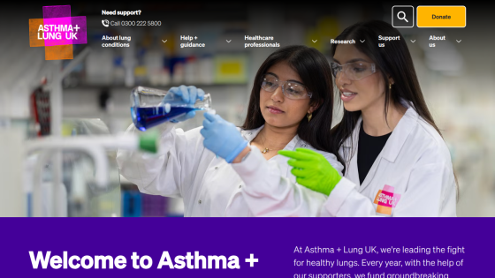 Homepage of Asthma + Lung UK featuring two women in lab coats conducting an experiment.
