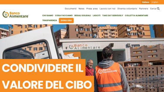 Banco Alimentare website with navigation and a hero image showing volunteers sharing food value