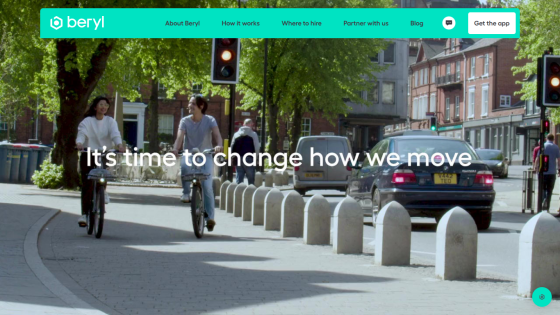 Beryl website header with navigation and a hero image showing two people cycling with the text 'It's time to change how we move'