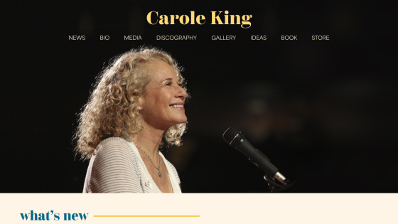 Carole King website header with navigation and a smiling woman speaking into a microphone