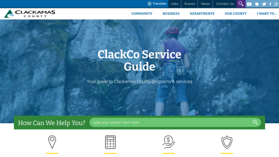 Clackamas County Service Guide homepage with search bar and service icons.