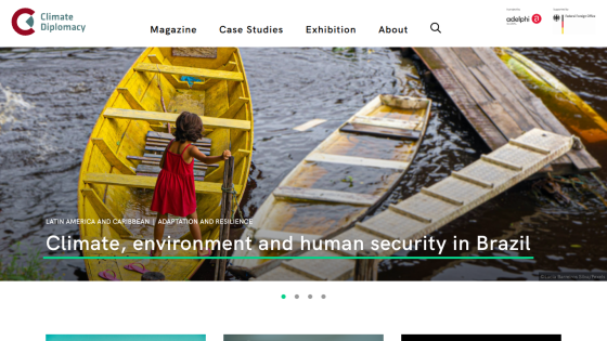 Website header with navigation and hero section showing a child in a yellow boat with text on climate, environment, and human security in Brazil