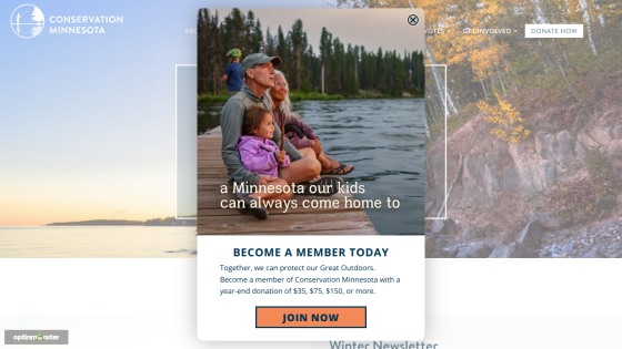Homepage with navigation bar, large hero image of a mountain landscape, and headline 'Explore the World with Us'