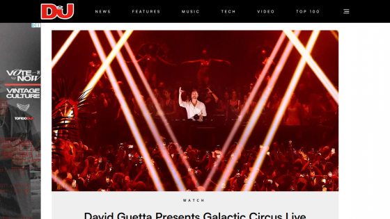 David Guetta performing at the Galactic Circus Live event with a vibrant crowd and lighting effects.
