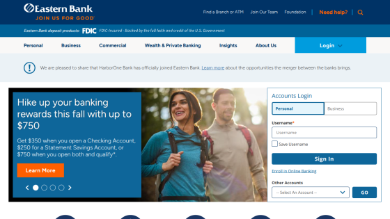 Eastern Bank homepage with navigation, promotional banner for banking rewards, and login section