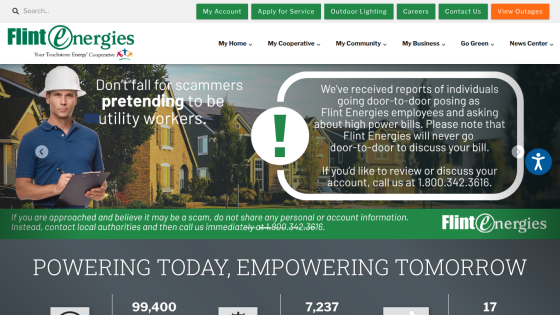 Flint Energies homepage with navigation bar, hero message about scam warnings, and community energy statistics