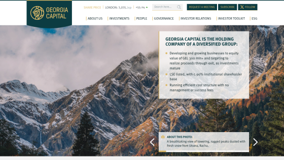 Homepage with navigation bar, large hero image of a mountain landscape, and headline 'Explore the World with Us'