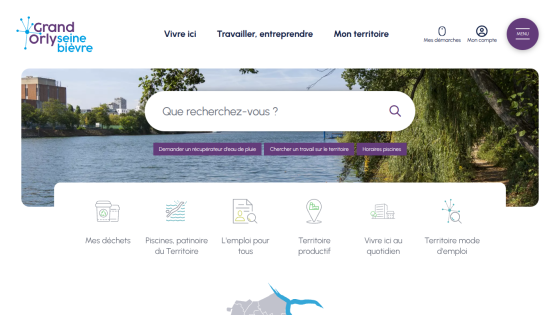 Grand Orly Seine Bièvre website with navigation links, search bar, and options for local services over a river and tree background