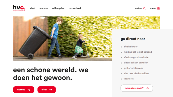 Homepage with navigation links and a hero image of children with a trash bin and scooter, promoting a clean world.