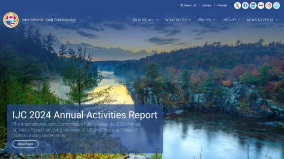 International Joint Commission homepage featuring 2024 Annual Activities Report with scenic river and forest background.