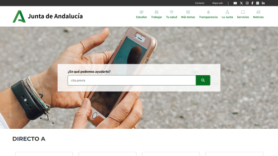 Search bar for services with a hand holding a phone in the background.