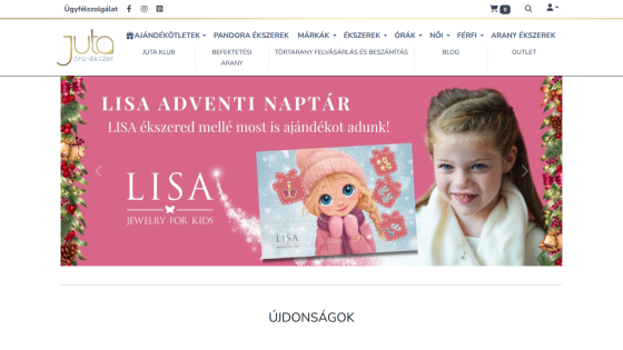 Jewelry website with a pink banner promoting Lisa Advent Calendar and jewelry for kids, featuring a girl and cartoon illustration