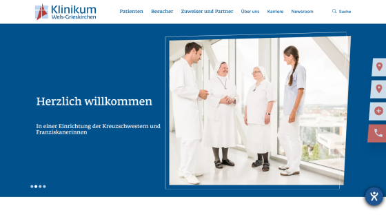 Welcome message for Klinikum Wels-Grieskirchen with staff photo and navigation links for patients, visitors, partners, and more