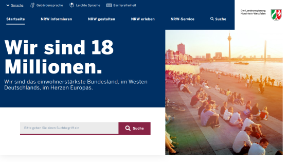 Homepage featuring the text 'Wir sind 18 Millionen.' with a scenic background and search bar.