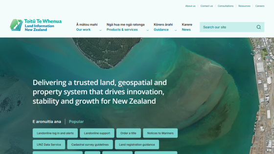Website homepage offering a trusted land, geospatial, and property system for New Zealand with navigation menu and subscription form.