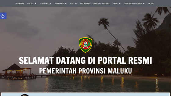 Official portal welcome page of Maluku Province government with tropical beach background and navigation menu