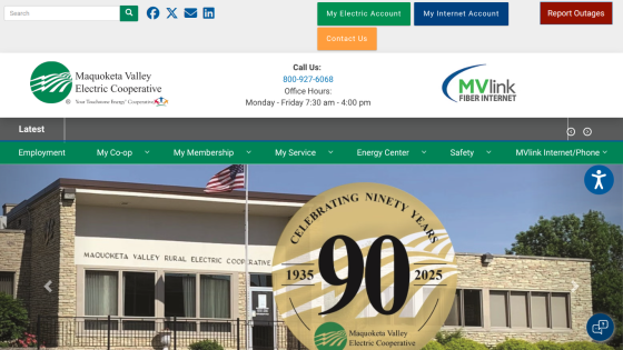 Maquoketa Valley Electric Cooperative website with navigation, contact info, and 90th anniversary hero image