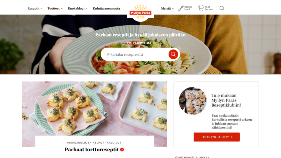 Recipe website homepage with a search bar over a pasta dish, navigation menu, and featured pastry recipes