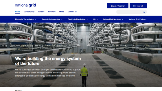 Homepage of National Grid showcasing energy infrastructure with a worker in a facility.