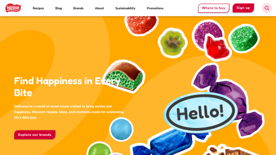 Nestlé website with navigation and colorful candy images, headline 'Find Happiness in Every Bite' and a call-to-action button