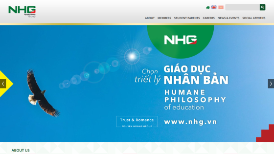 NHG education website with a blue sky background, eagle image, and text about humane philosophy of education